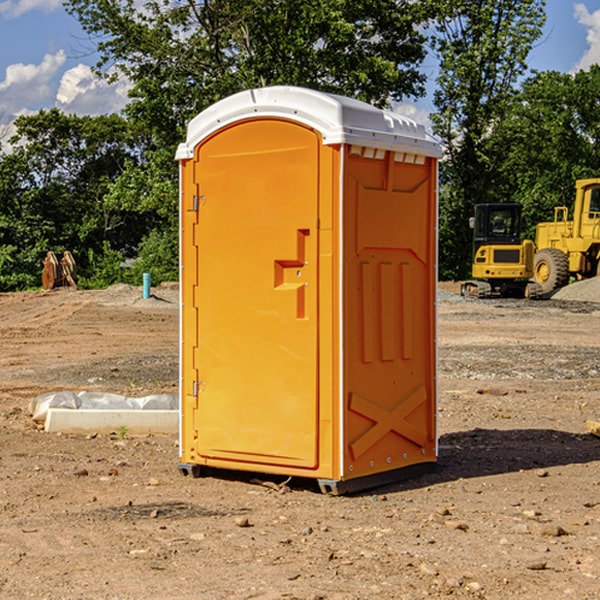 how often are the portable restrooms cleaned and serviced during a rental period in DeWitt Iowa